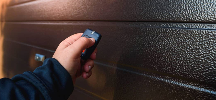 automatic door opener with remote control in Florida Ridge